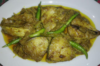 Dteamed Ilish with shorshe and curd